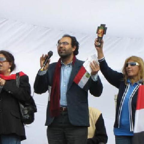 Coptic Christians pray during a protest in Tahrir Square during the 2011 Egyptian protests.
