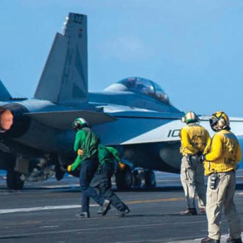An F/A-18F Super Hornet takes off from the USS Theodore Roosevelt in the South China Sea, Jan. 23.