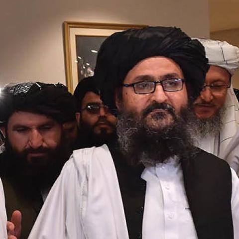 Taliban co-founder Mullah Abdul Ghani Baradar leaves after signing an agreement with the United States during a ceremony in the Qatari capital Doha on February 29, 2020.