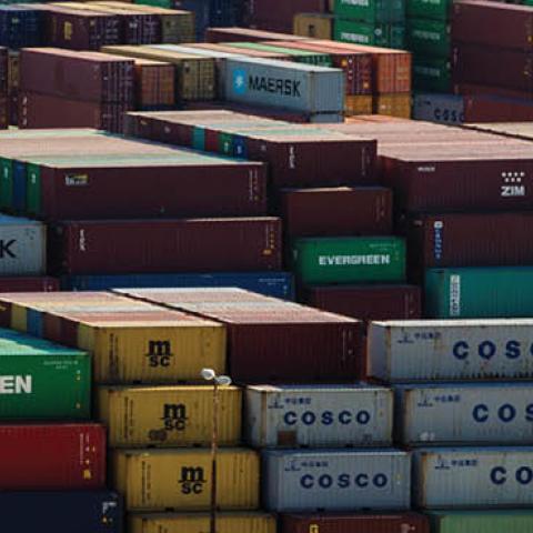Containers stacked in COSCO owned yard in Piraeus on March 4, 2015. (Photo by NurPhoto vie Getty Images)