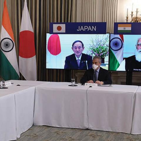 President Joe Biden, with Secretary of State Antony Blinken, meets virtually with members of the "Quad" alliance of Australia, India, Japan and the US on March 12, 2021 (Photo by OLIVIER DOULIERY/AFP via Getty Images) 