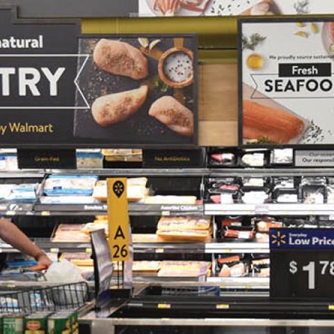 Customers wearing face masks shop at a Walmart supermarket amid novel coronavirus outbreak on July 15, 2020 in Washington, DC. (Photo by Sha Hanting/China News Service via Getty Images)