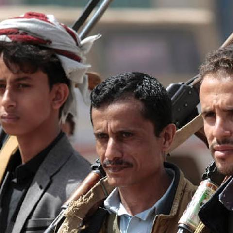 Houthi rebel fighters hold their weapons during a gathering aimed at mobilizing more fighters before heading to battlefronts (Photo by Hani Al-Ansi/picture alliance via Getty Images)
