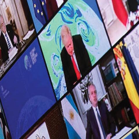 Vladimir Putin, Xi Jinping, Turkey's President  Erdogan, UK Prime Minister Boris Johnson, and President Joe Biden are seen on a screen during a climate change virtual summit (Photo by BRENDAN SMIALOWSKI/AFP via Getty Images)