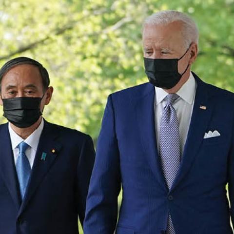 US President Joe Biden and Japan's Prime Minister Yoshihide Suga walk through the Colonnade to take part in a joint press conference in the Rose Garden of the White House in Washington, DC on April 16, 2021 (Photo by MANDEL NGAN/AFP via Getty Images)