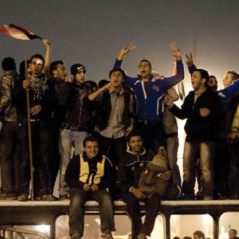 Egyptian anti-government protesters celebrate at Tahrir Square in Cairo on February 11, 2011 after President Hosni Mubarak stepped down after three decades of autocratic rule and handed power to a junta of senior military commanders (Getty Images)