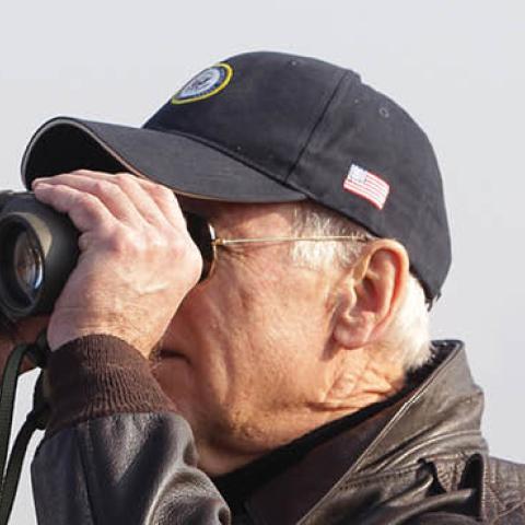 U.S. Vice President Joe Biden looks through binoculars toward North Korea during a visits to observation post Ouellette at the Demilitarized Zone (DMZ) on December 7, 2013 in Panmunjom, South Korea (Photo by Chung Sung-Jun/Getty Images)