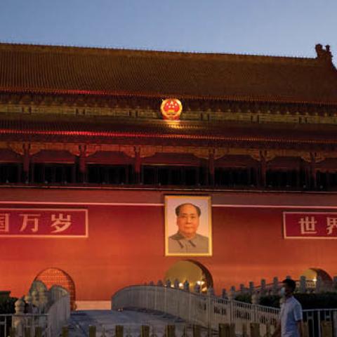 A man wearing a face mask walks in front of Tiananmen during the 31st anniversary of the June 4, 1989 crackdown on pro-democracy protests, in Beijing on June 4, 2020 (Photo by NOEL CELIS/AFP via Getty Images)