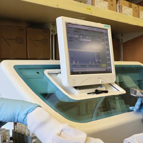 Medical laboratory scientist, Aniela Sobel, tests serology samples from the Novavax phase 3 Covid-19 clinical vaccine trial at the UW Medicine Retrovirology Research Lab at Harborview Medical Center on February 12 (Photo by Karen Ducey/Getty Images)