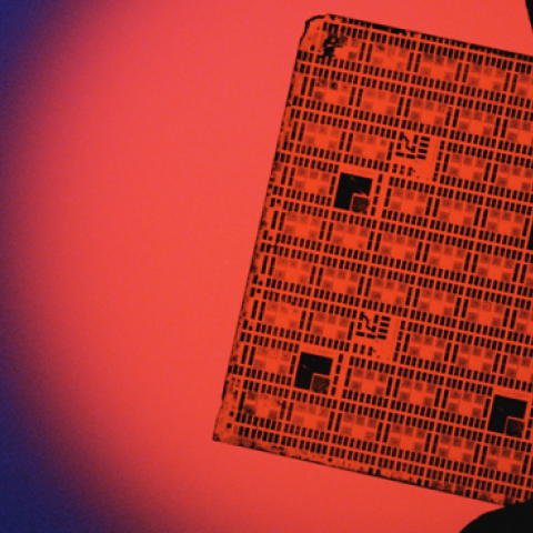 Light reflects through an integrated circuit. (Lawrence Manning/Getty Images)