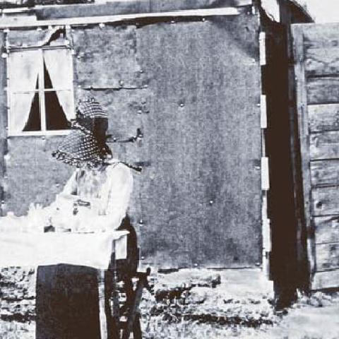 Mina Westbye, left, at her homestead ‘villa’ in North Dakota, ca. 1905.