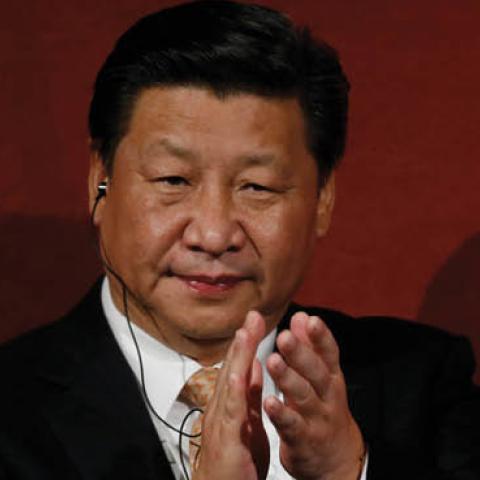hina's President Xi Jinping applauds during his participation in the Australia China state and provincial leaders forum on November 19, 2014 in Sydney, Australia (Jason Reed - Pool/Getty Images)