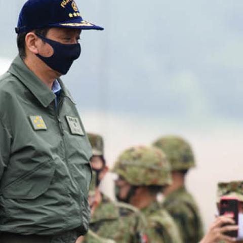 Nobuo Kishi, Japan's defense minister, attends Japan's Ground Self-Defense Forces (JGSDF) live fire exercise at JGSDF's training grounds in the East Fuji Maneuver Area on May 22, 2021 in Gotemba, Shizuoka, Japan (Photo by Akio Kon - Pool/Getty Images)
