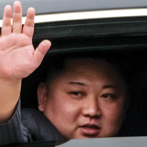 Kim Jong-un waves from his car after arriving by train at Dong Dang railway station near the border with China on February 26, 2019 in Lang Son, Vietnam (Photo by Linh Pham/Getty Images)