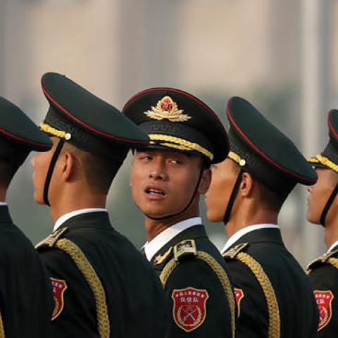 Members of a Chinese honor guard stand in formation before a ceremony to mark Martyr's Day at Tiananmen Square in Beijing, Monday, Sept. 30, 2019. (Photo by Mark Schiefelbein - Pool/Getty Images)