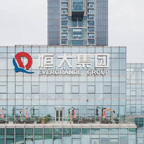 The logo of Evergrande Group is seen on the façade of the company headquarters on February 9, 2021 in Shenzhen, Guangdong Province of China. (Photo by Shen Longquan/VCG via Getty Images)