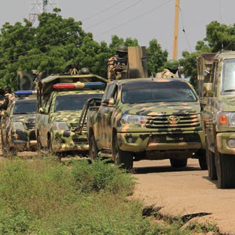 Nigerian soldiers patrol on October 12, 2019, after gunmen suspected of belonging to the Islamic State West Africa Province (ISWAP) group raided the village of Tungushe, killing a soldier and three residents. (Photo by AFP via Getty Images)