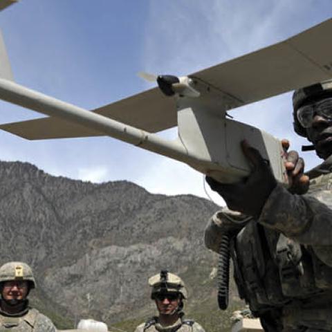 A U.S. soldier prepares an RQ-11 Raven miniature unmanned aerial vehicle during a mission in Nishagam, Afghanistan. (Liu Jin/AFP via Getty Images)