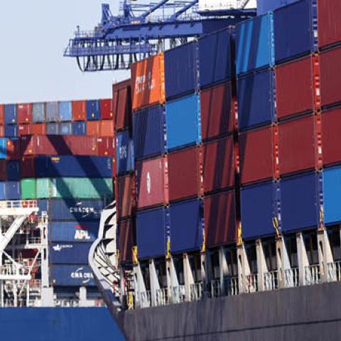 Cargo containers sit stacked on ships at the Port of Los Angeles, the nation’s busiest container port, on October 15, 2021 in San Pedro, California. (Photo by Mario Tama/Getty Images)