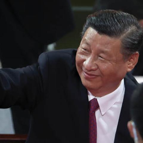 Xi Jinping waves as he attends the art performance celebrating the 100th anniversary of the Founding of the Communist Party of China on June 28, 2021 in Beijing, China. (Photo by Lintao Zhang/Getty Images)