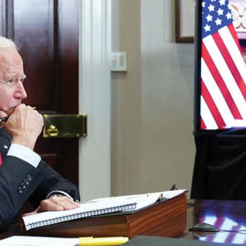 U.S. President Joe Biden meets with China's President Xi Jinping during a virtual summit from the Roosevelt Room of the White House in Washington, DC, November 15, 2021. (Photo by MANDEL NGAN/AFP via Getty Images)