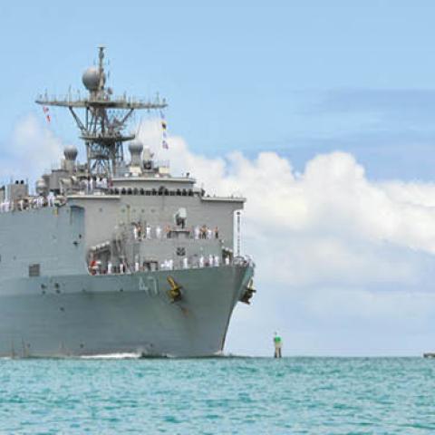 The amphibious dock landing ship USS Rushmore (LSD 47) transits to Joint Base Pearl Harbor-Hickam for the Rim of the Pacific (RIMPAC) 2014 exercise. (U.S. Navy)