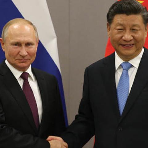 Russian President Vladimir Putin and Chinese President Xi Jinping during their bilateral meeting on November 13, 2019 in Brasilia, Brazil. (Photo by Mikhail Svetlov/Getty Images)