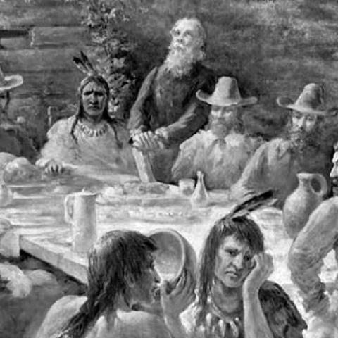 A painting depicts the first Thanksgiving. (Photo by H. Armstrong Roberts/ClassicStock/Getty Images)