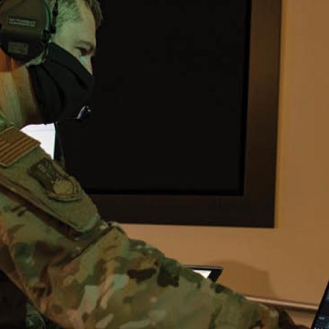 U.S. Air Force Maj. Nicholas Tensing monitors a computer in support of the Advanced Battle Management System Onramp 2 on Sept. 2, 2020 at Joint Base Andrews, Maryland. (Senior Airman Daniel Hernandez/U.S. Air Force)