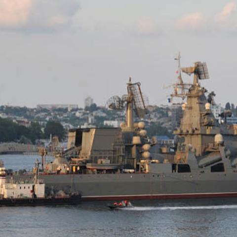 A Russian Moskva guided missile cruiser participates in a naval parade near a Ukrainian military base in Sevastopol. (Vasily Maximov/AFP via Getty Images)