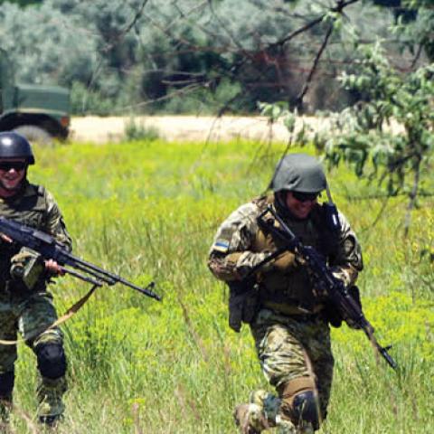 Servicemen conduct a land operation on the Oleshky Sands military training ground close to Crimea as part of the Sea Breeze 2021 maritime exercise held by NATO and its partner nations from June 28 through July 10. (Photo by Stringer\TASS via Getty Images)