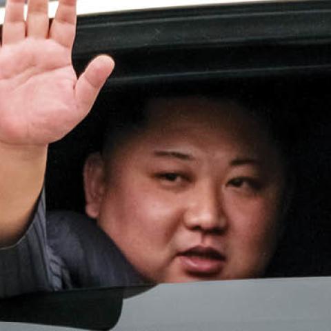 Kim Jong-un waves from his car after arriving by train at Dong Dang railway station near the border with China on February 26, 2019 in Lang Son, Vietnam. (Photo by Linh Pham/Getty Images)