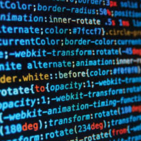 Computer code being edited on an electronic device. (Getty Images)