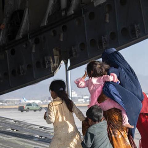 Passengers are loaded aboard a U.S. Air Force C-17 in Kabul, Afghanistan. (Master Sgt. Donald R. Allen/U.S. Air Forces Europe-Africa via Getty Images)