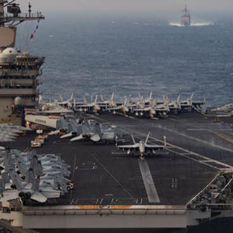 The aircraft carrier USS Nimitz steams ahead of the guided-missile cruiser USS Princeton during Malabar 2020 exercises in the north Arabian Sea, November 17, 2020. (US Navy)