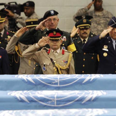 United Nations Command soldiers salute during a repatriation ceremony at Yangsan U.S. military base on April 12, 2007 in Seoul, South Korea. (Photo by Chung Sung-Jun/Getty Images)