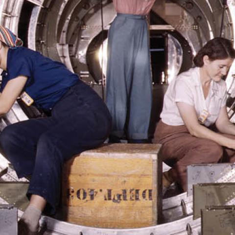 Women workers install fixtures and assemblies to a tail fuselage section of a B-17 bomber at the Douglas Aircraft Company plant, Long Beach, California in 1942. (Photo by Buyenlarge/Getty Images)