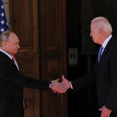 Russian President Vladimir Putin shakes hands with U.S. President Joe Biden during their meeting in Geneva on June 16, 2021. (Photo by Alexander Zemlianichenko/Pool/AFP via Getty Images)