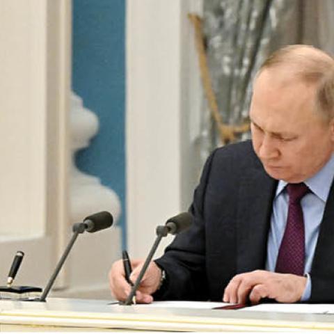 Russia's President Vladimir Putin signed a declaration on allied cooperation between Russia and Azerbaijan at Moscow's Kremlin on February 22, 2022. (Getty Images)
