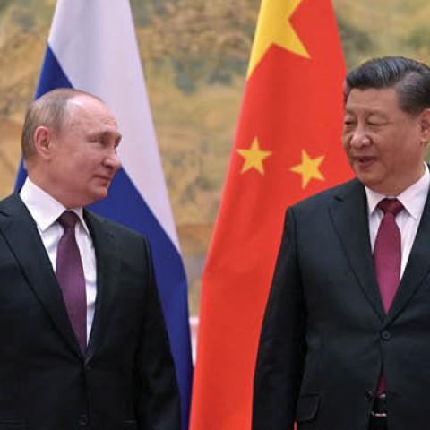 Russian President Vladimir Putin and Chinese Leader Xi Jinping pose during their meeting in Beijing, on February 4, 2022. (Photo by Alexei Druzhinin/Sputnik/AFP via Getty Images)