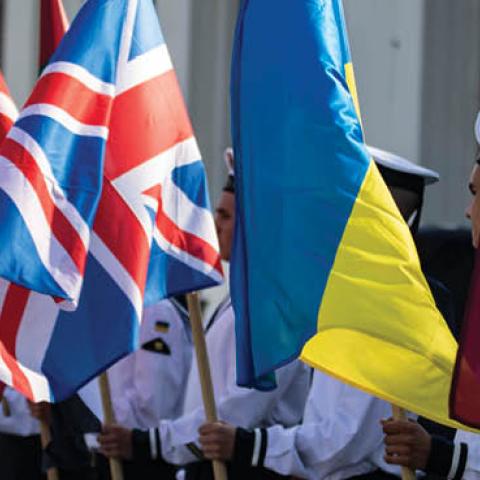 Ukrainian navy sailors hold the flags of participating countries in Exercise Sea Breeze 2021 in Odesa, Ukraine, July 4, 2021. (U.S. Navy)