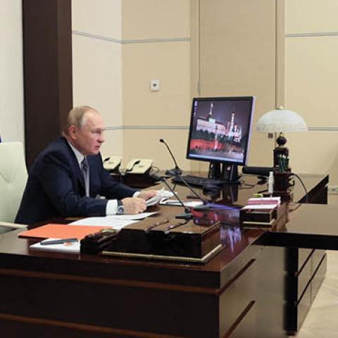 Russian President Vladimir Putin holds a meeting with Chinese President Xi Jinping via a video link at the Novo-Ogaryovo state residence outside Moscow on December 15, 2021. (Photo by Mikhail Metzel/Sputnik/AFP via Getty Images)