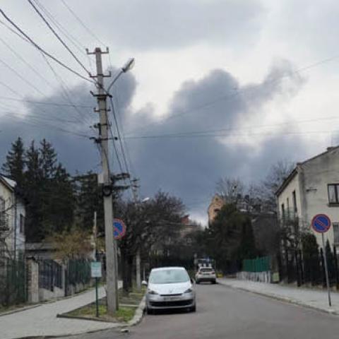 Smoke billows over Lviv after a Russian cruise missile strike on an oil storage depot in the city, March 26, 2022 / James Barnett