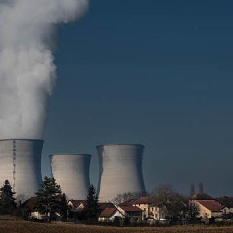 Water vapor rising from chimneys of the Bugey nuclear power plant on January 25, 2022, in Saint-Vulbas, France. (Photo by Jean-Philippe Ksiazek/AFP via Getty Images)