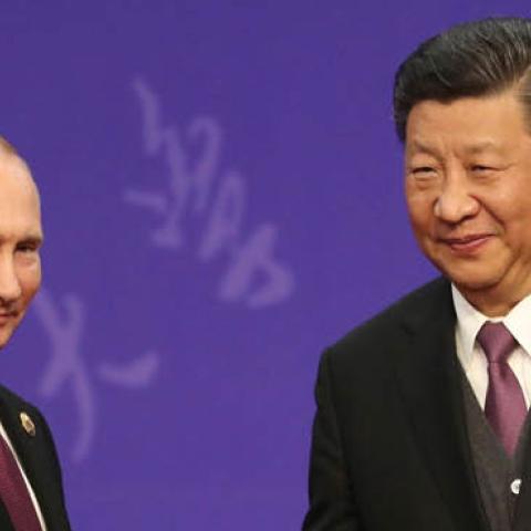 Russian President Vladimir Putin with Chinese Leader Xi Jinping at Friendship Palace on April 26, 2019 in Beijing, China. (Photo by Kenzaburo Fukuhara - Pool/Getty Images)