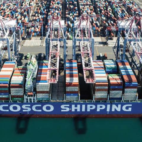 Aerial view of a container ship of COSCO shipping unloading cargoes at the Port of Los Angeles on October 26, 2021 in San Pedro, California. (Photo by Qian Weizhong/VCG via Getty Images)