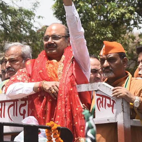 Delhi BJP President Adesh Gupta with BJP party candidate Rajesh Bhatia flash the victory sign on June 6, 2022 in New Delhi, India. (Photo by Sonu Mehta/Hindustan Times via Getty Images)