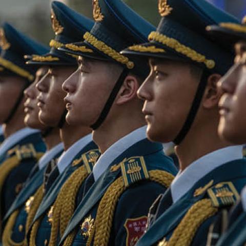 Members of a People's Liberation Army band stand together at a ceremony marking the 100th anniversary of the Communist Party on July 1, 2021, at Tiananmen Square in Beijing, China. (Getty Images)