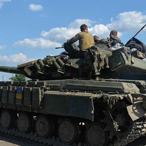 A tank sits outside Lysychansk, waiting to move into the city on June 19, 2022. (Photo by Madeleine Kelly/SOPA Images/LightRocket via Getty Images)