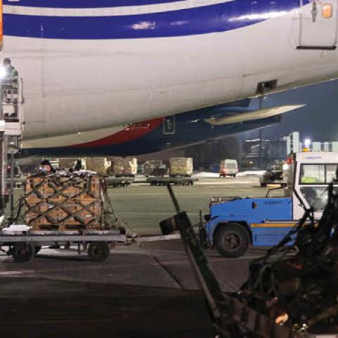 A ground crew unload weapons and other military hardware delivered by the United States military at Boryspil Airport near Kyiv on January 25, 2022, in Boryspil, Ukraine. (Photo by Sean Gallup/Getty Images)